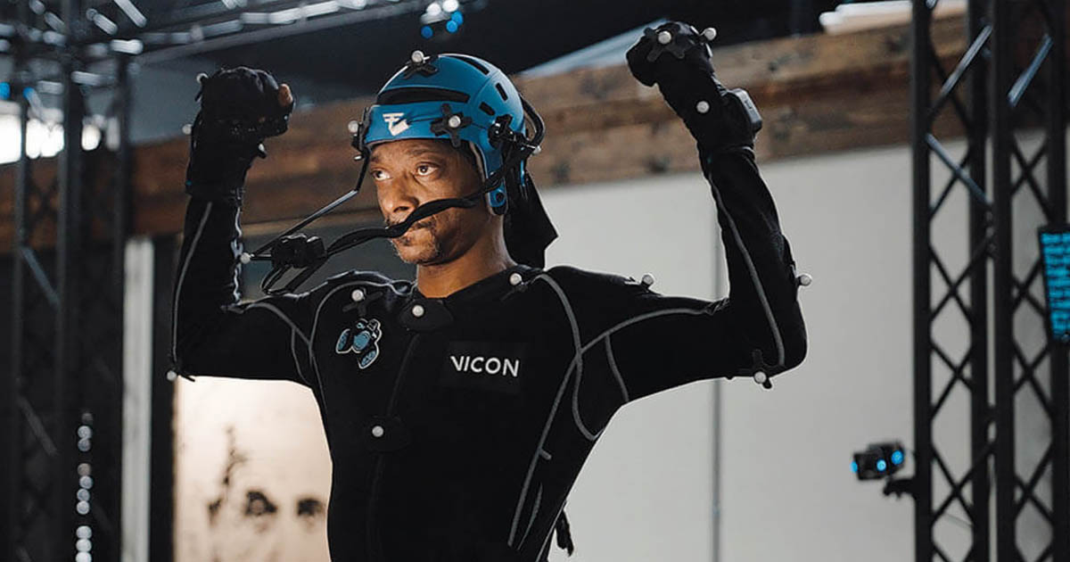 Optical motion capture system tracking reflective markers on an actor using multiple cameras